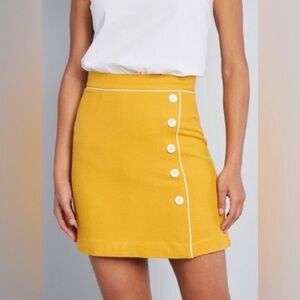 ModCloth Own the Era mustard yellow mini skirt